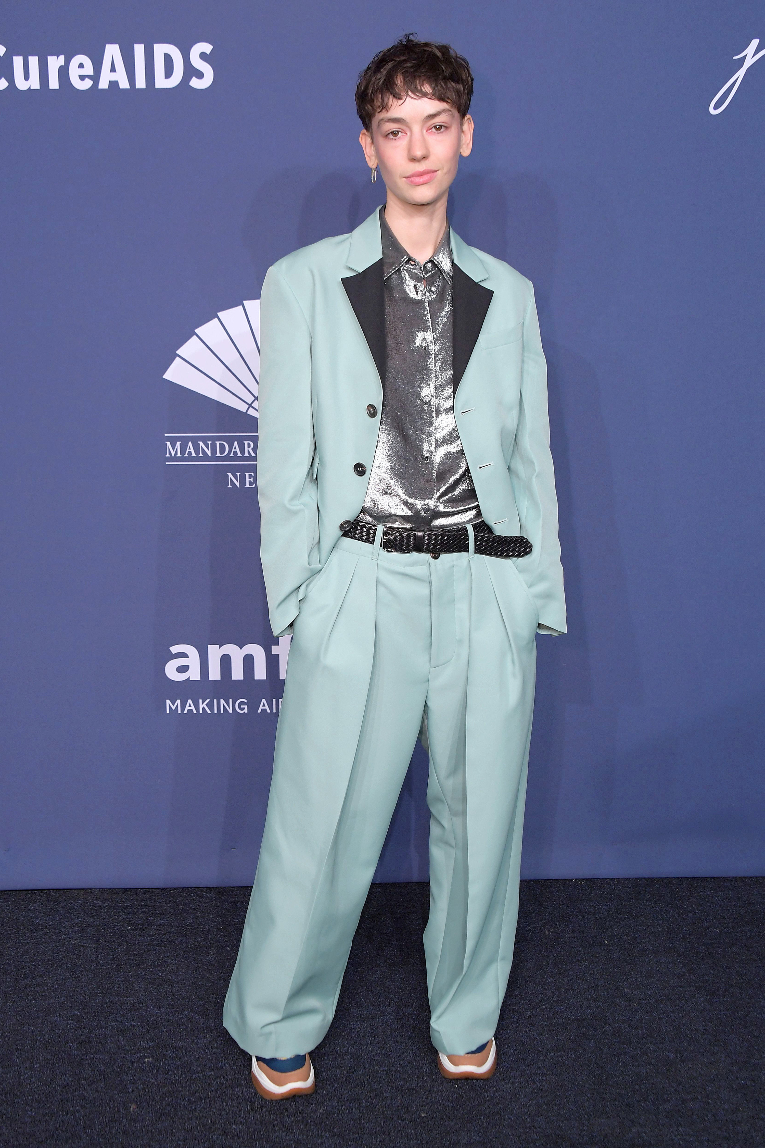 Brigette in a pantsuit on the red carpet