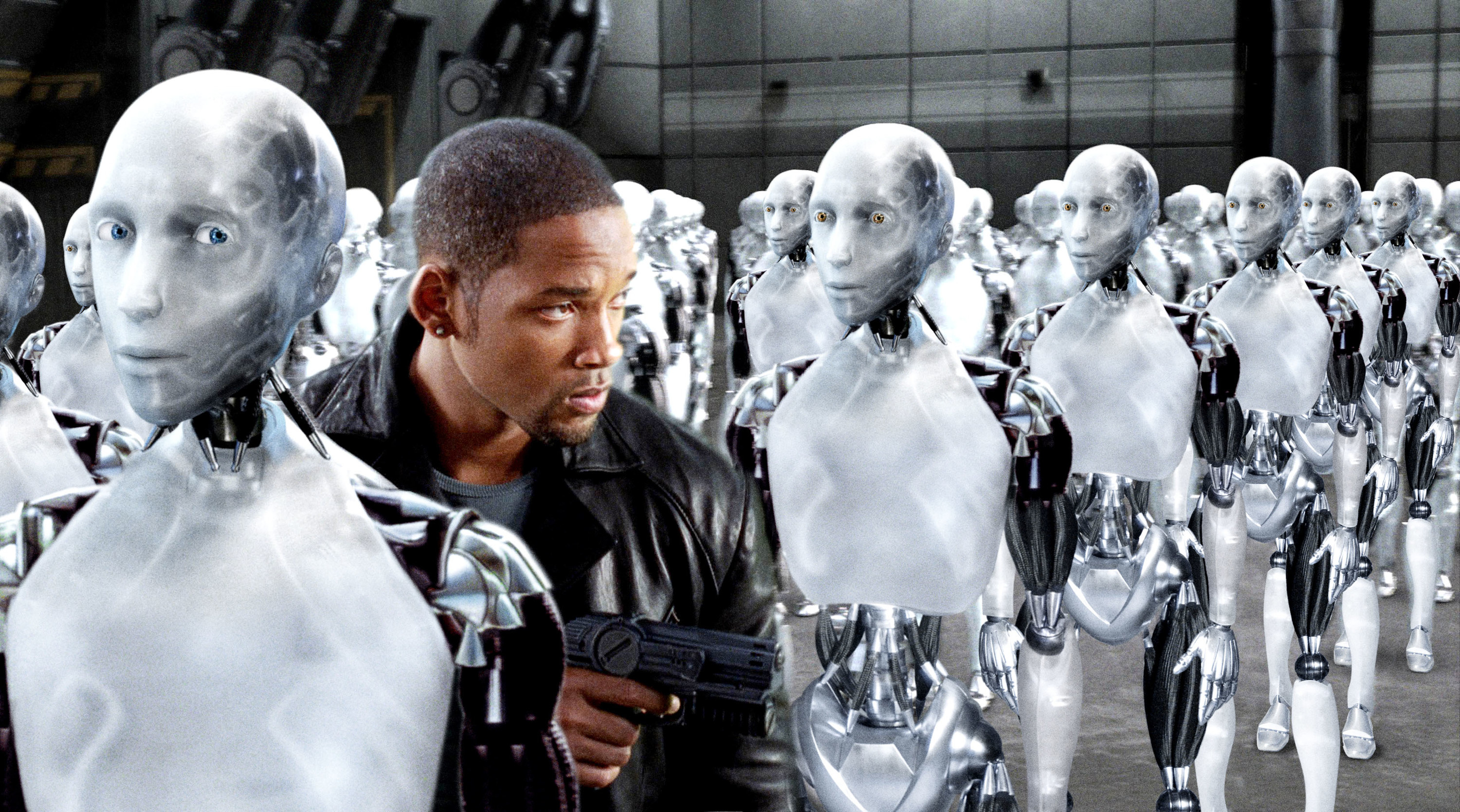 A man walks through troops of robots