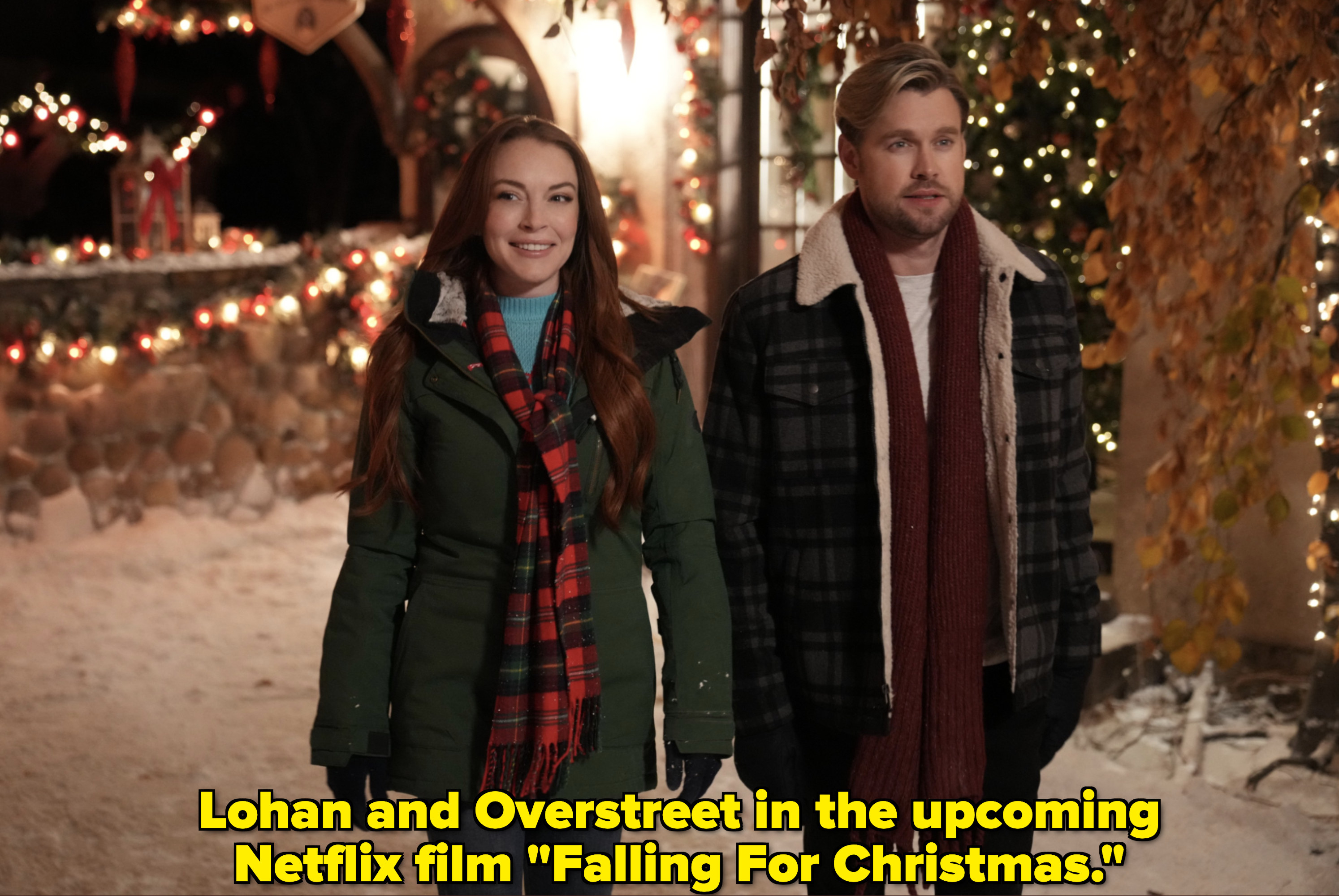 Lohan and Overstreet walking in snow together