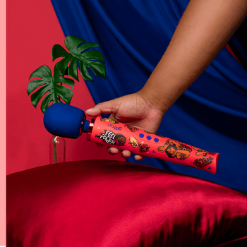Model holding orange and blue designer wand vibrator