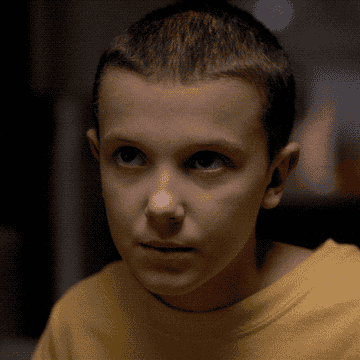 eleven from stranger things smiling