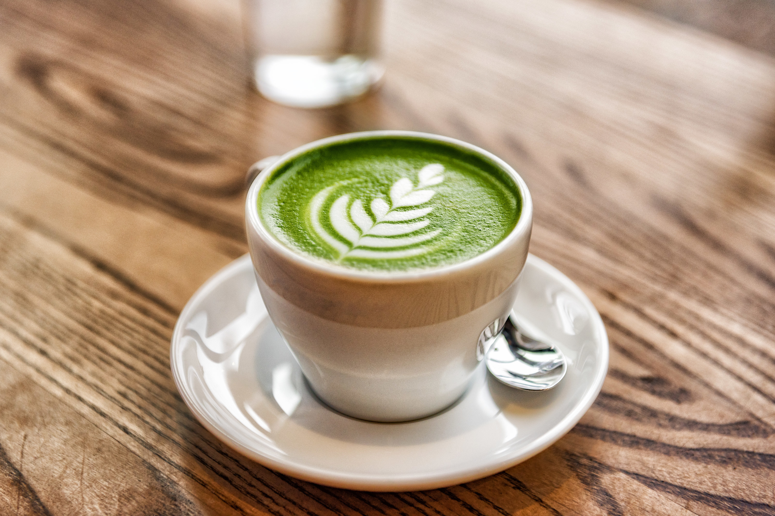 hot matcha latte with latte art
