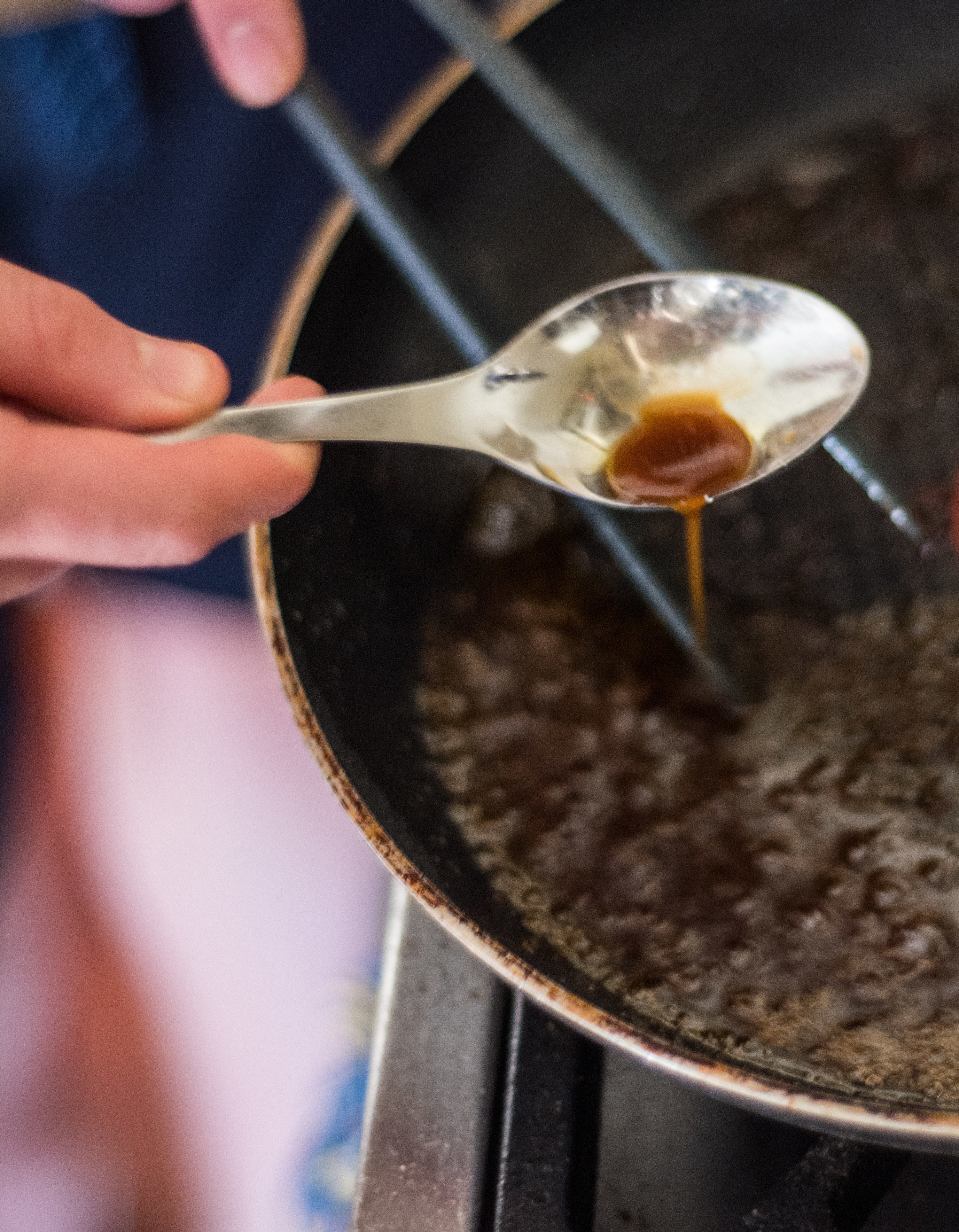 Worcestershire sauce being poured into a pan