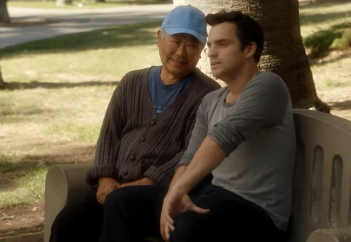 scene from New Girl where the character sits on a park bench to talk to an older friend