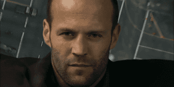 Jason Statham bounces off of the roof of a car and lands, all in terrible CGI