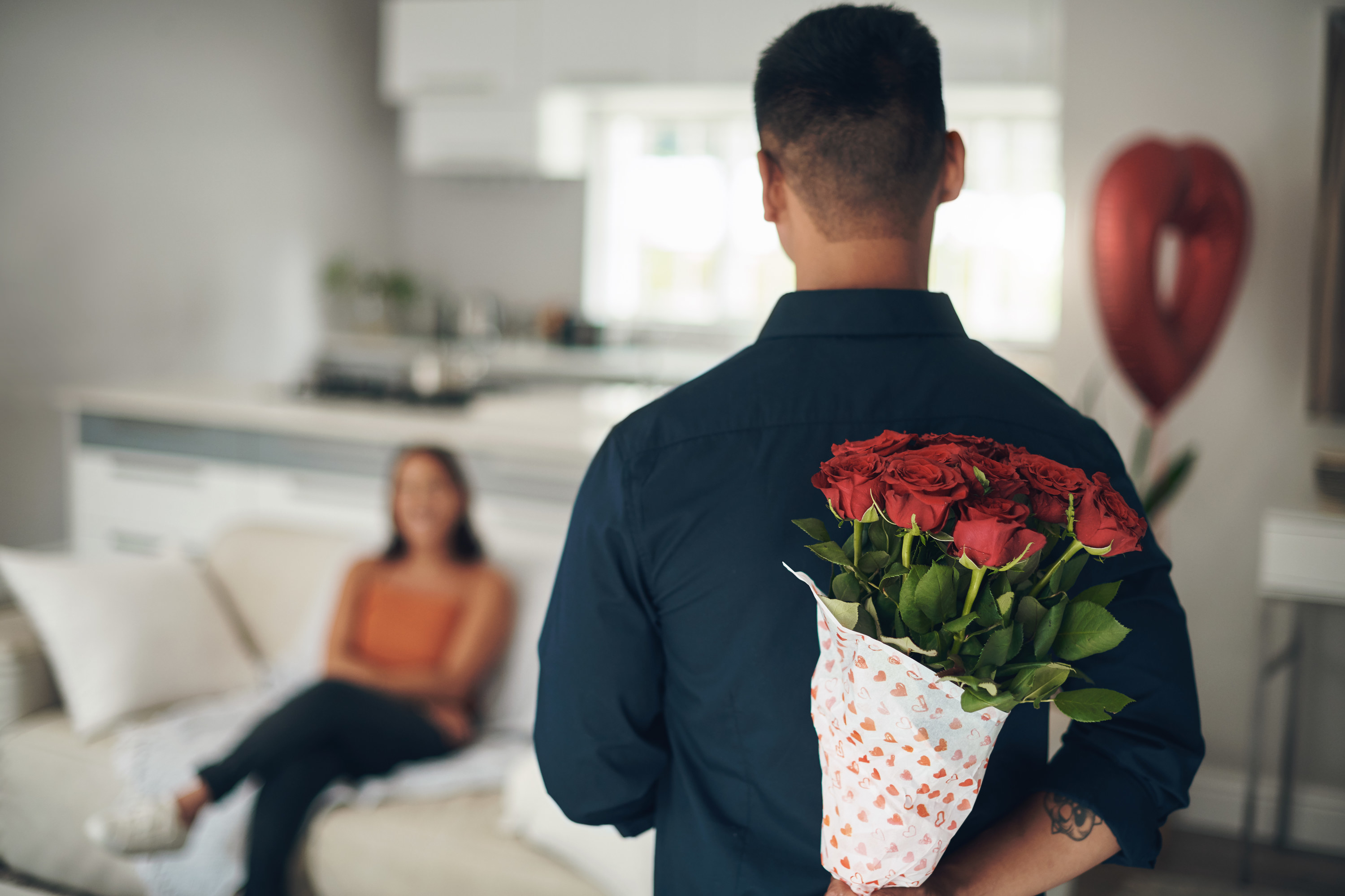 A man getting flowers for his gf