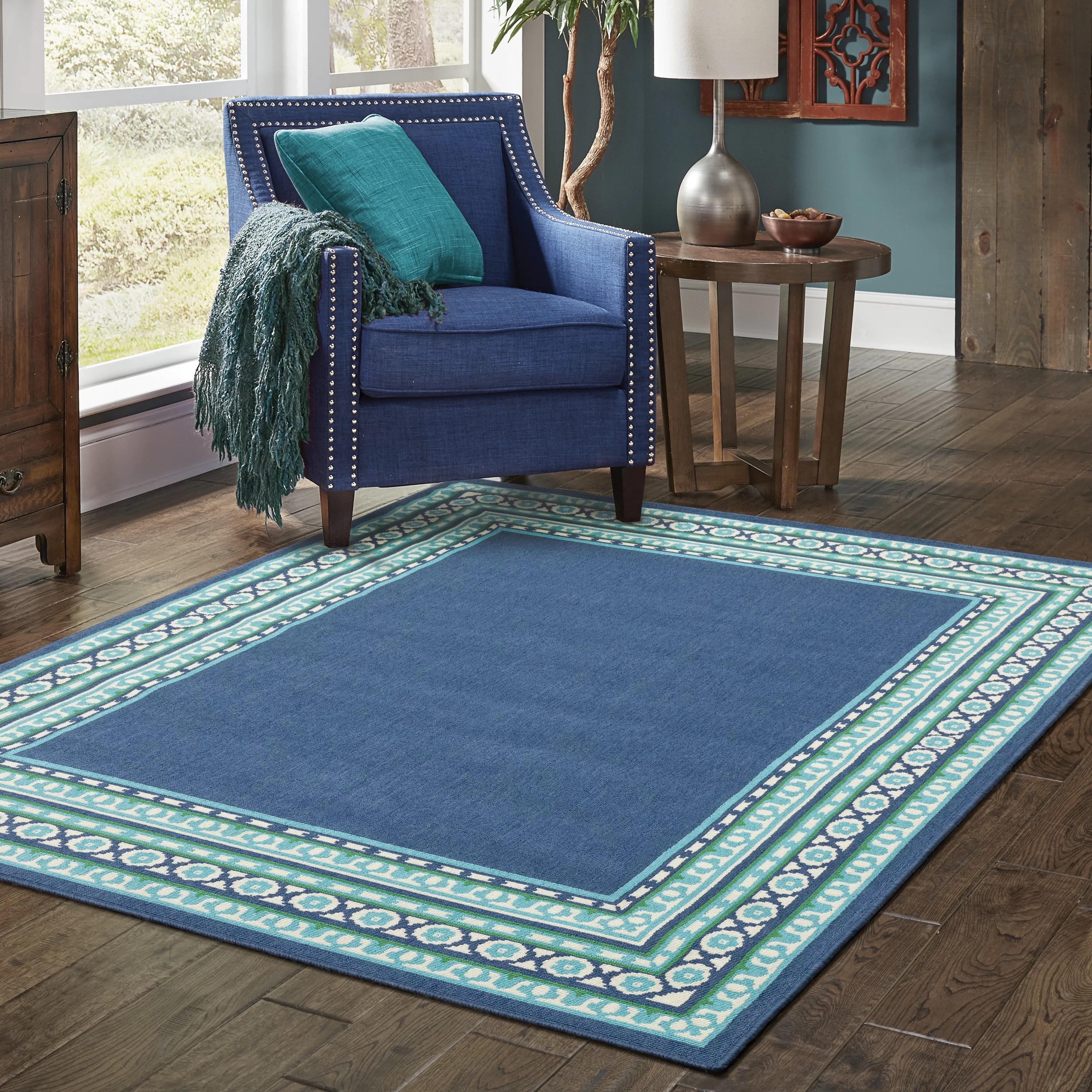a blue and teal southwestern rug