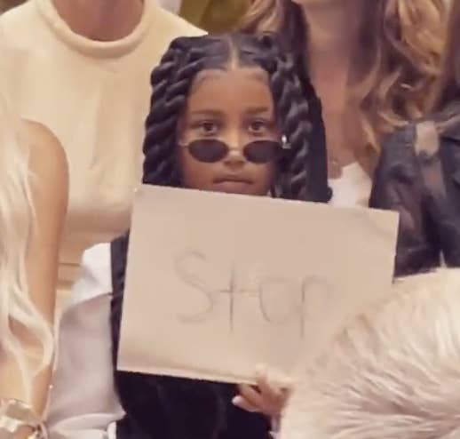 North West holding a sign that says &quot;Stop&quot;