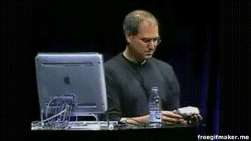 Steve Jobs throwing a camera to someone off stage