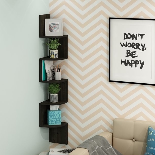 Shelves hung in corner filled with small decor