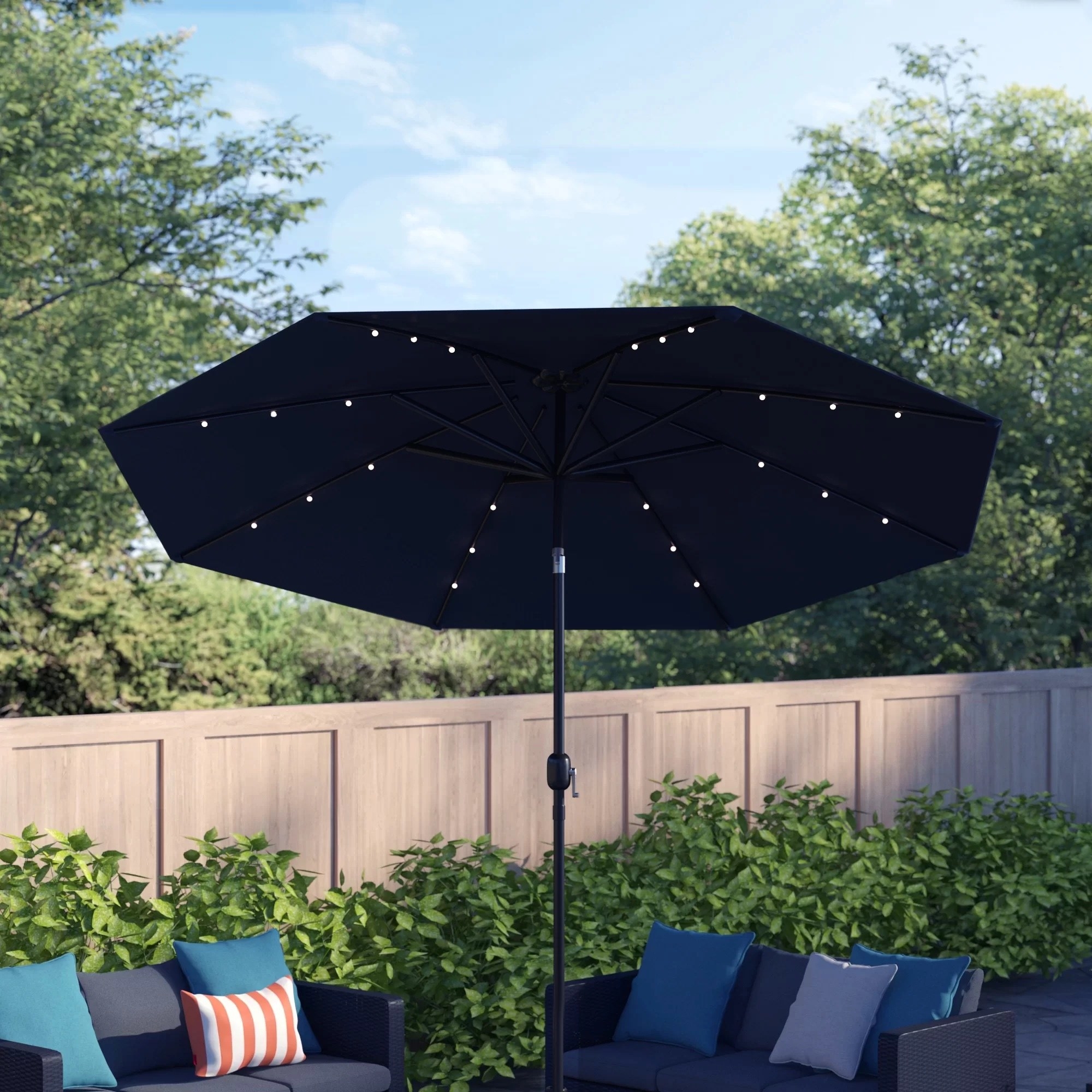 a navy lighted umbrella in a patio