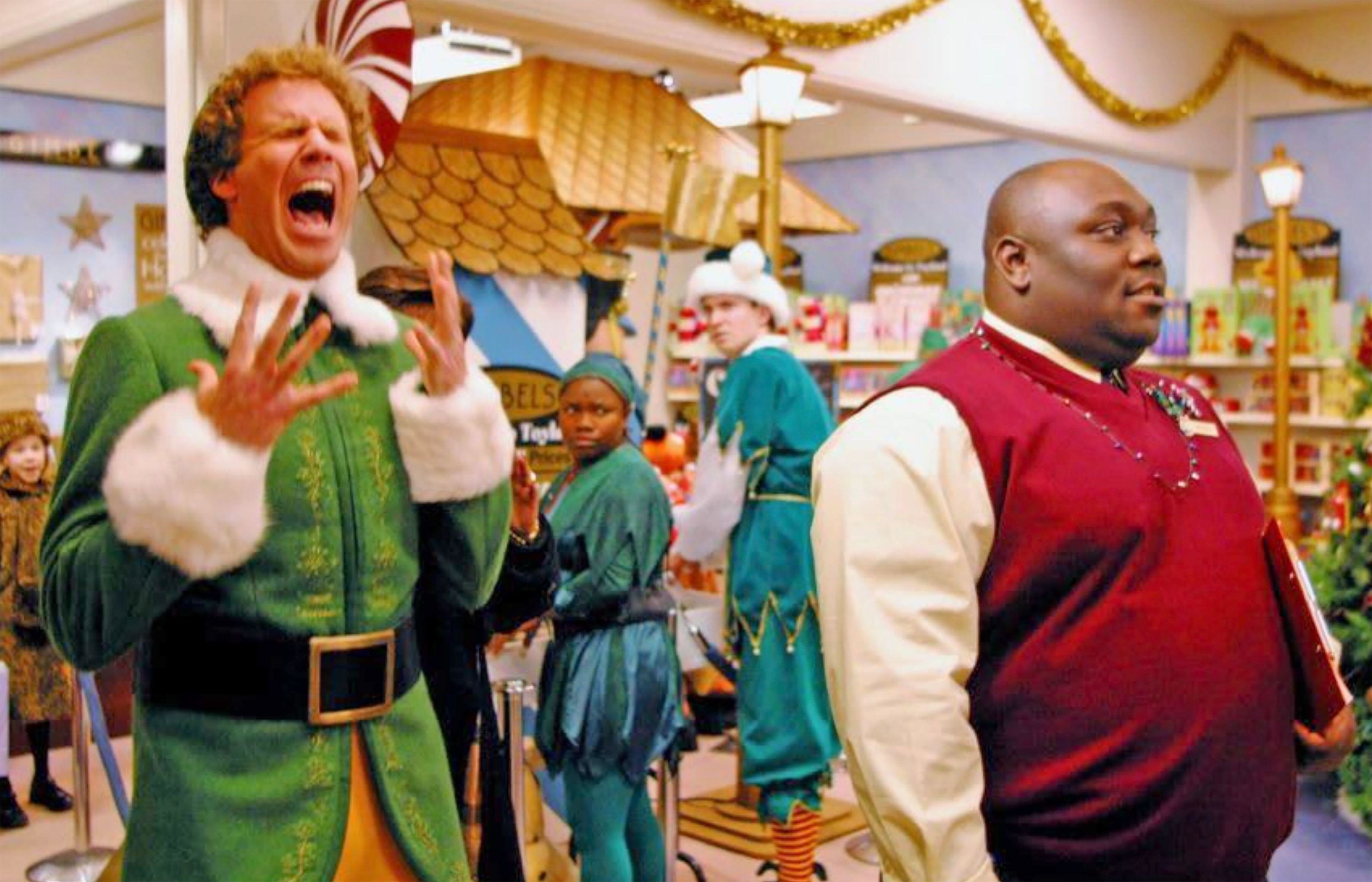 will ferrell and faizon love as buddy and the gimbals manager in a department store chistmas section in elf