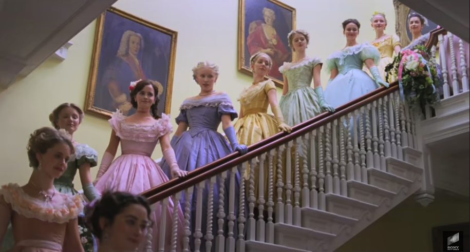 Emma Watson in a line of debutantes in "Little Women