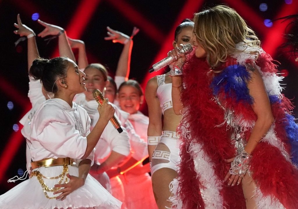 Jennifer Lopez and her daughter Emme Muniz (L) perform during the halftime show of Super Bowl LIV