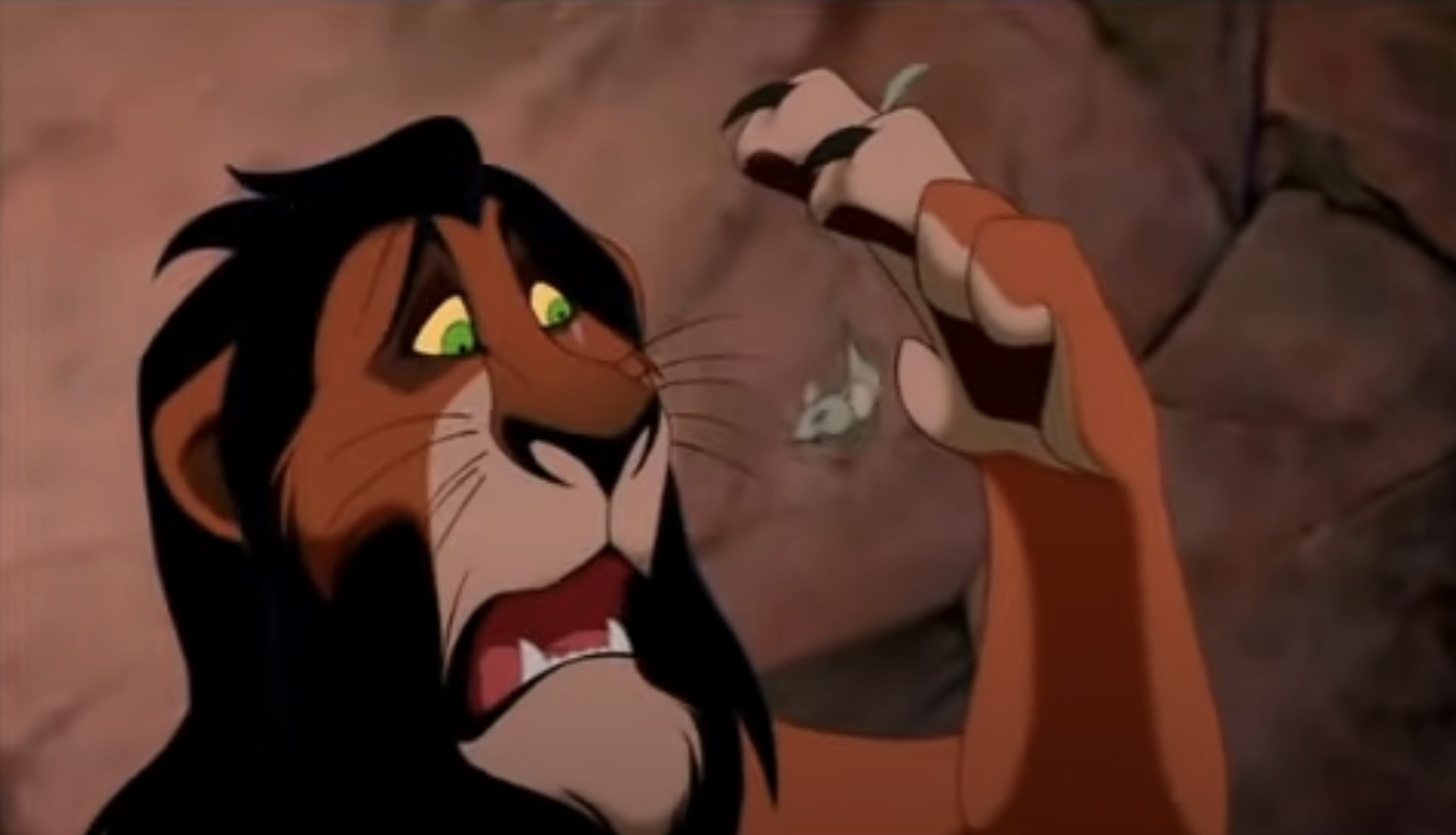 scar about to eat a mouse