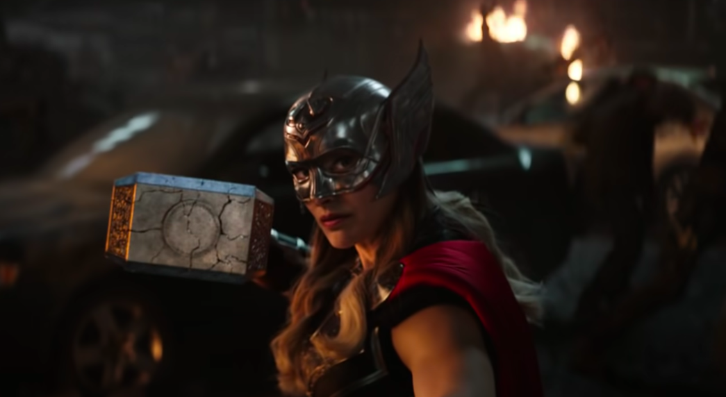 wearing her Mighty Thor helmet and armor, Jane catches Mjolnir