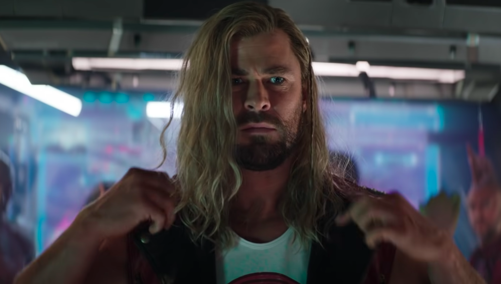 Thor pops the collar on his sleeveless denim vest