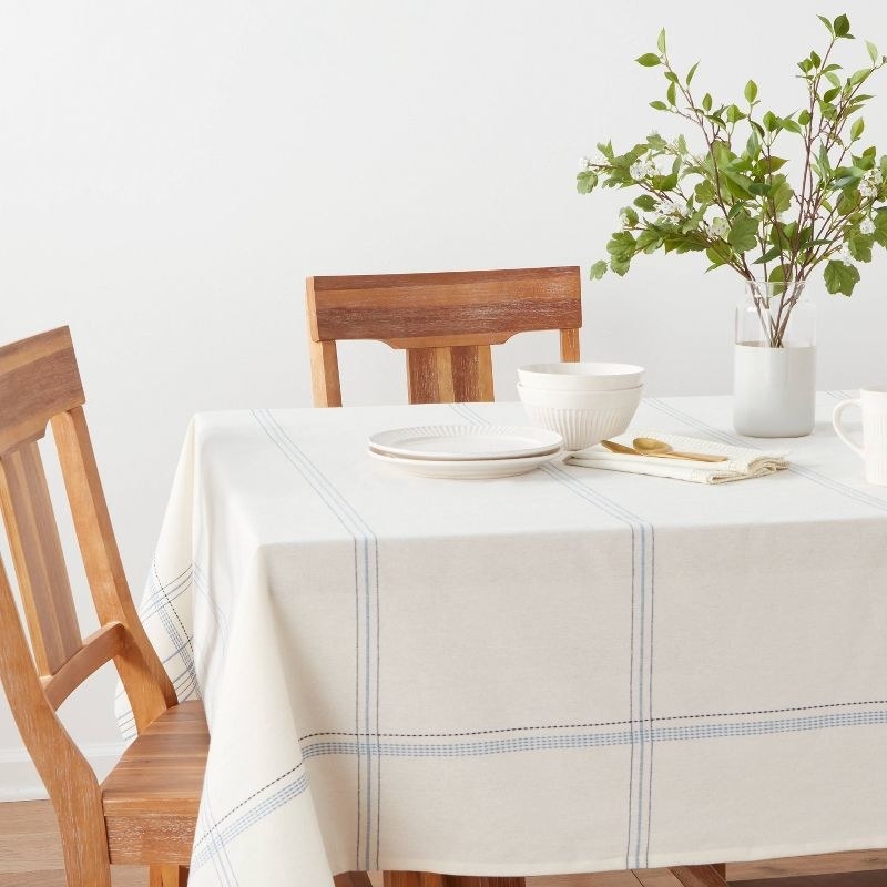 The blue and white tablecloth on a table