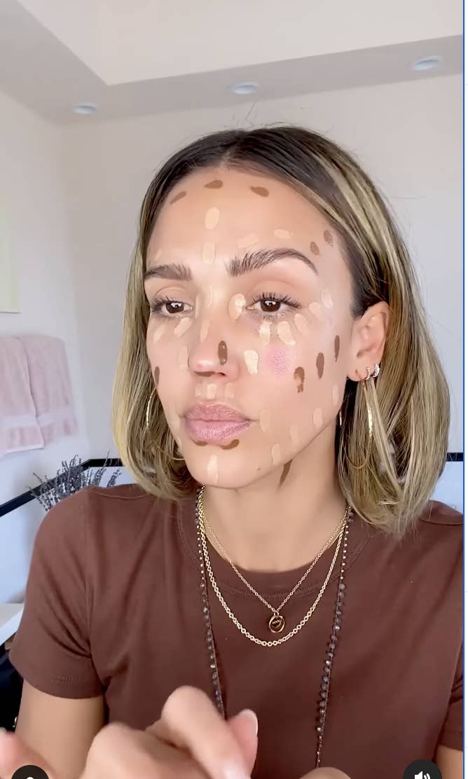 A woman with makeup smudges on her face