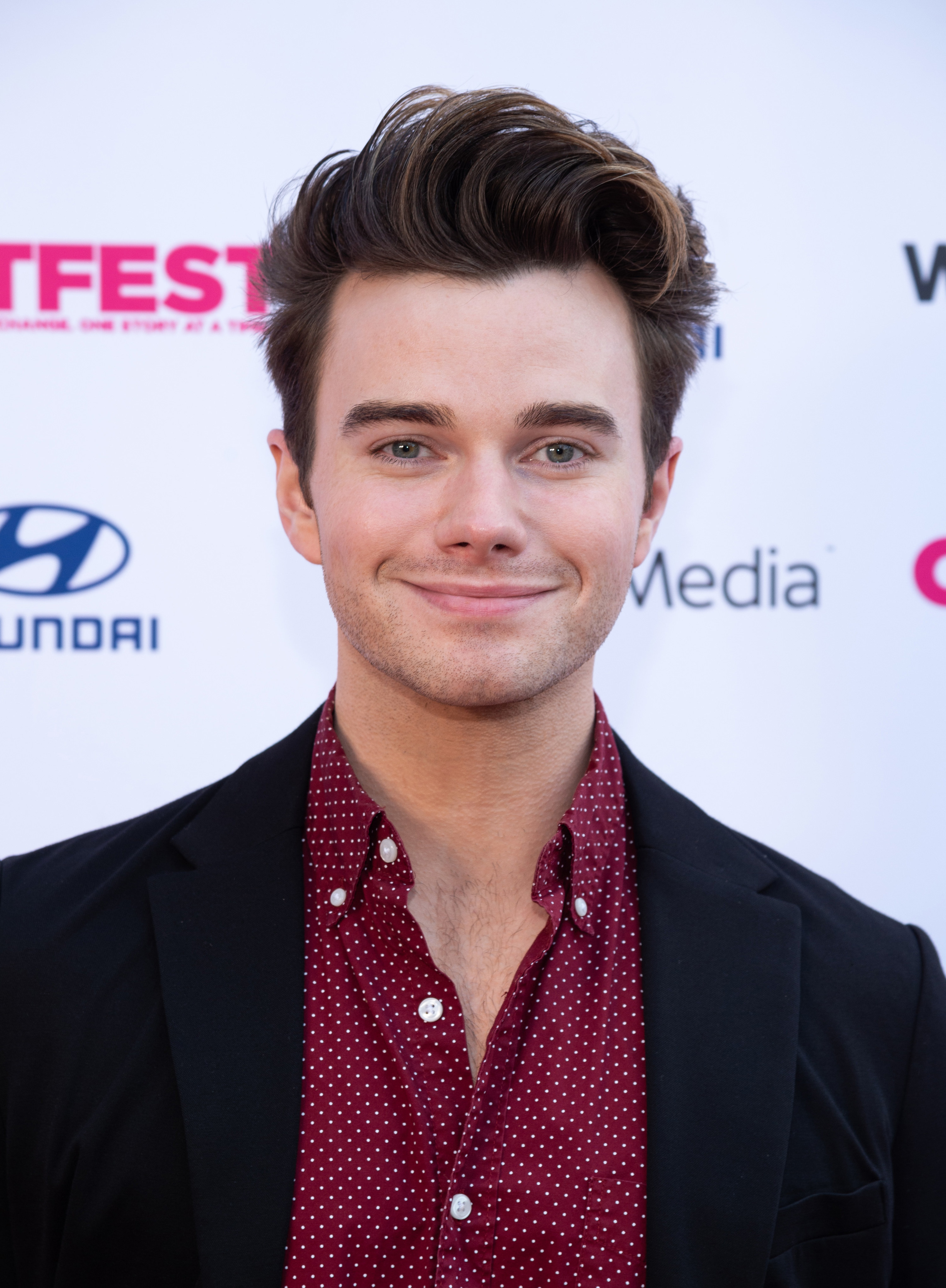 Chris Colfer smiles at the Outfest Los Angeles LGBTQ Film Festival premiere of &quot;The Sixth Reel&quot; in August 2021