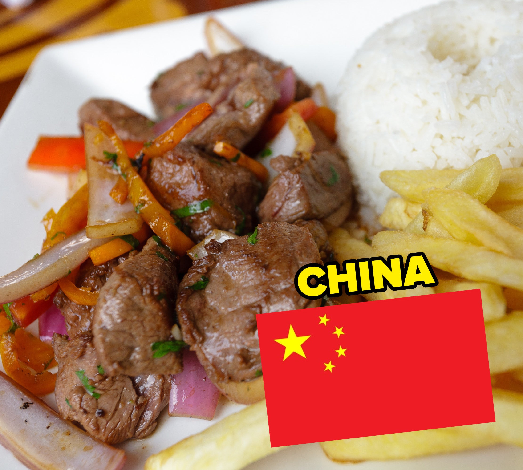 lomo saltado with a Chinese flag