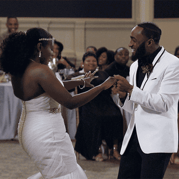 Amani and Woody dance at their wedding