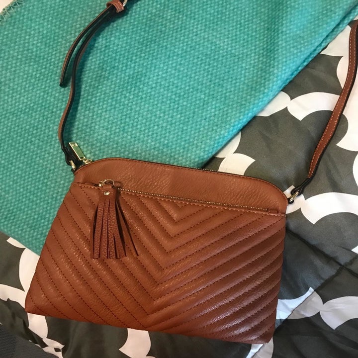 reviewer photo of the brown crossbody bag