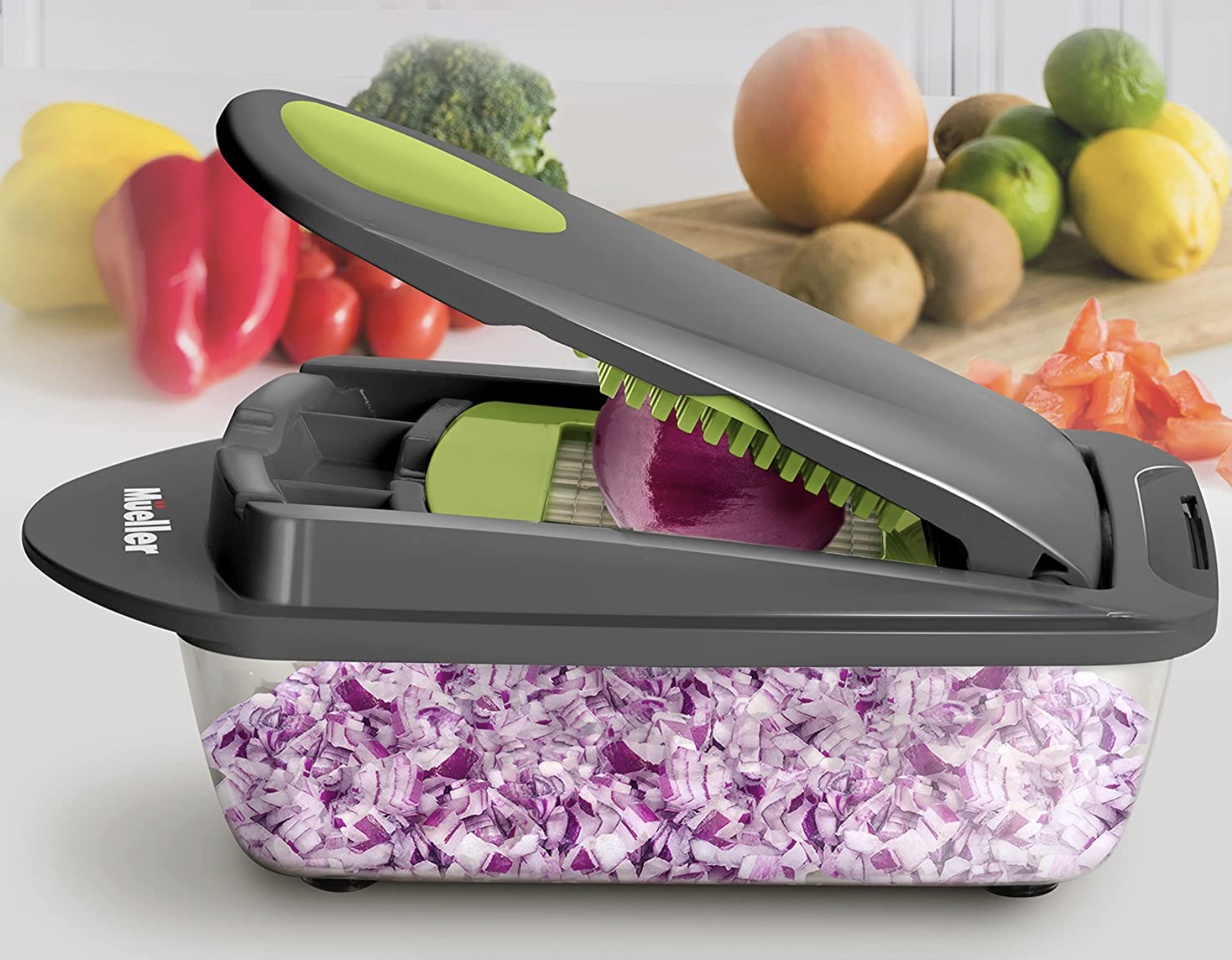 container with slicer on top and a chopped onion inside