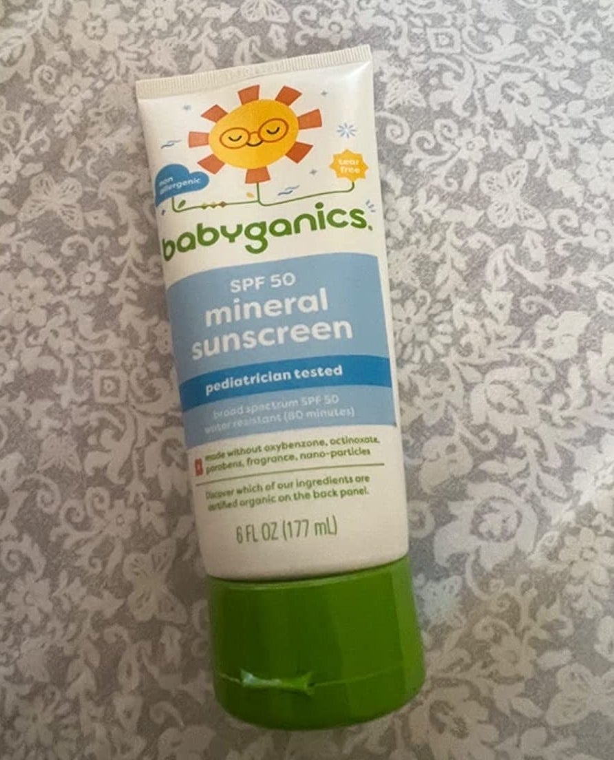 a reviewer photo of the bottle of sunscreen