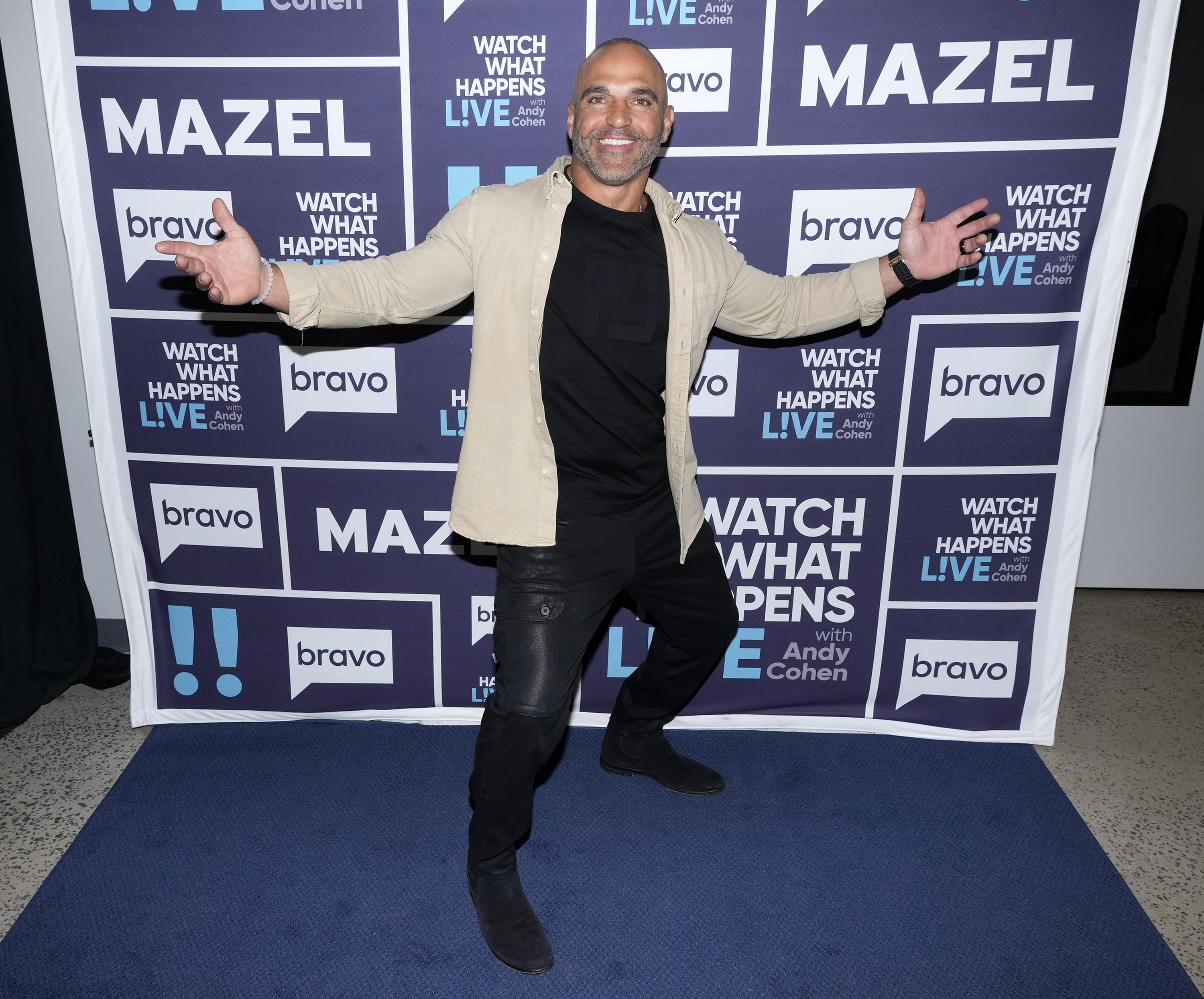 Joe Gorga posing and smiling at an event for Watch What Happens Live