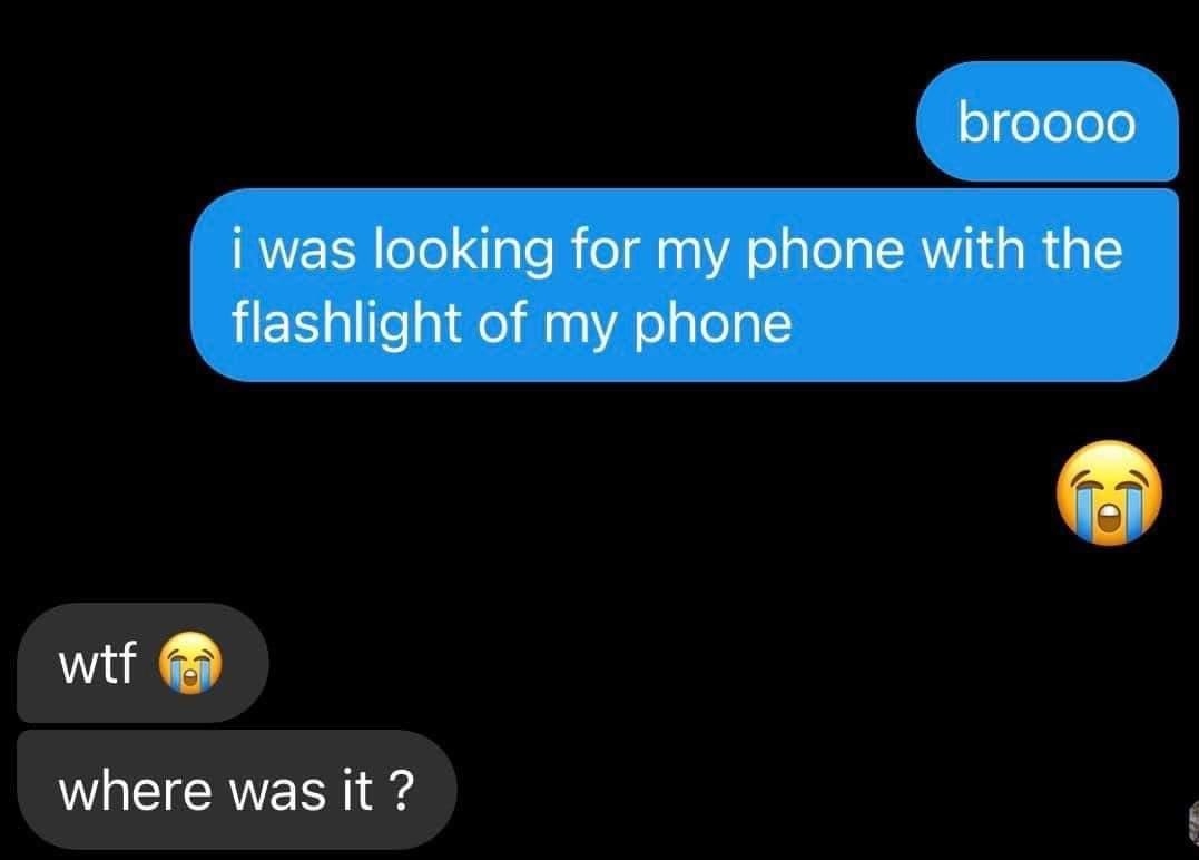 person looking for theeir phone with their phone&#x27;s flashlight