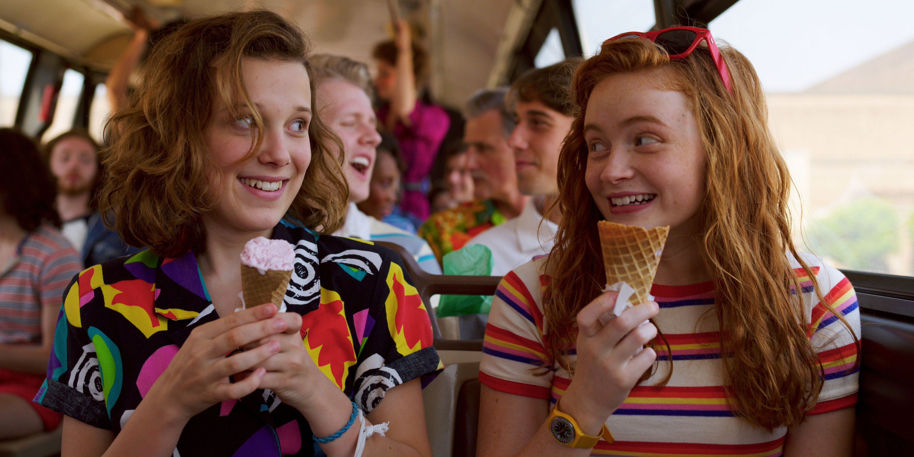 Eleven and Max eating ice cream and smiling