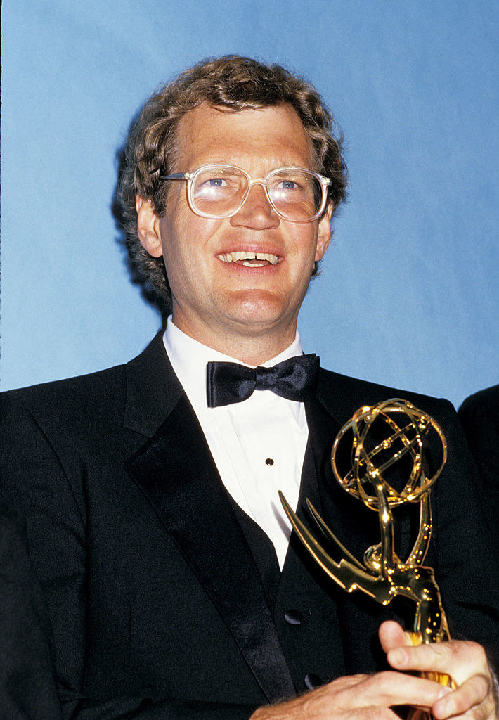 David Letterman holding an Emmy