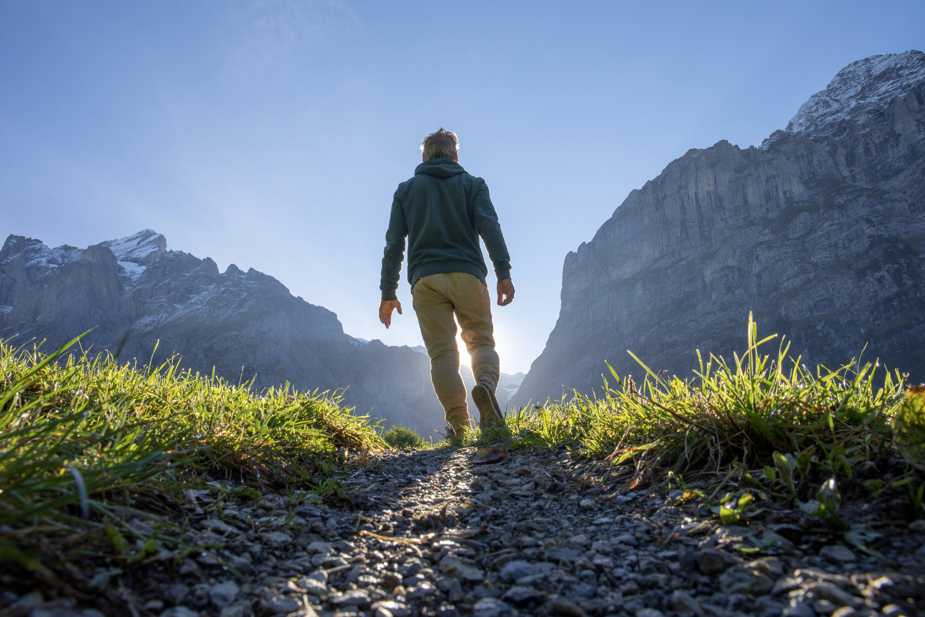 a person walking down a trail