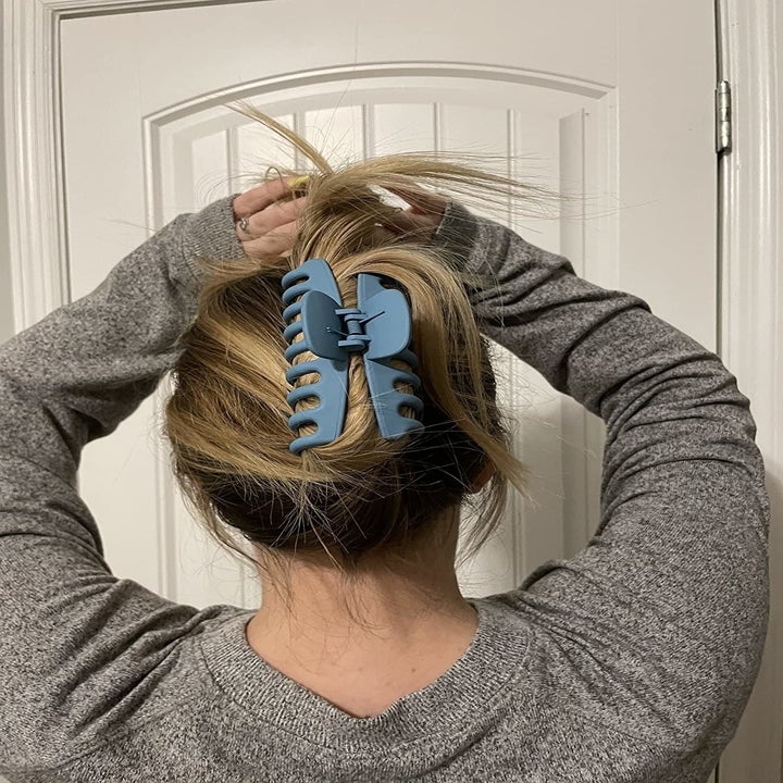 blue claw clip in reviewer's hair