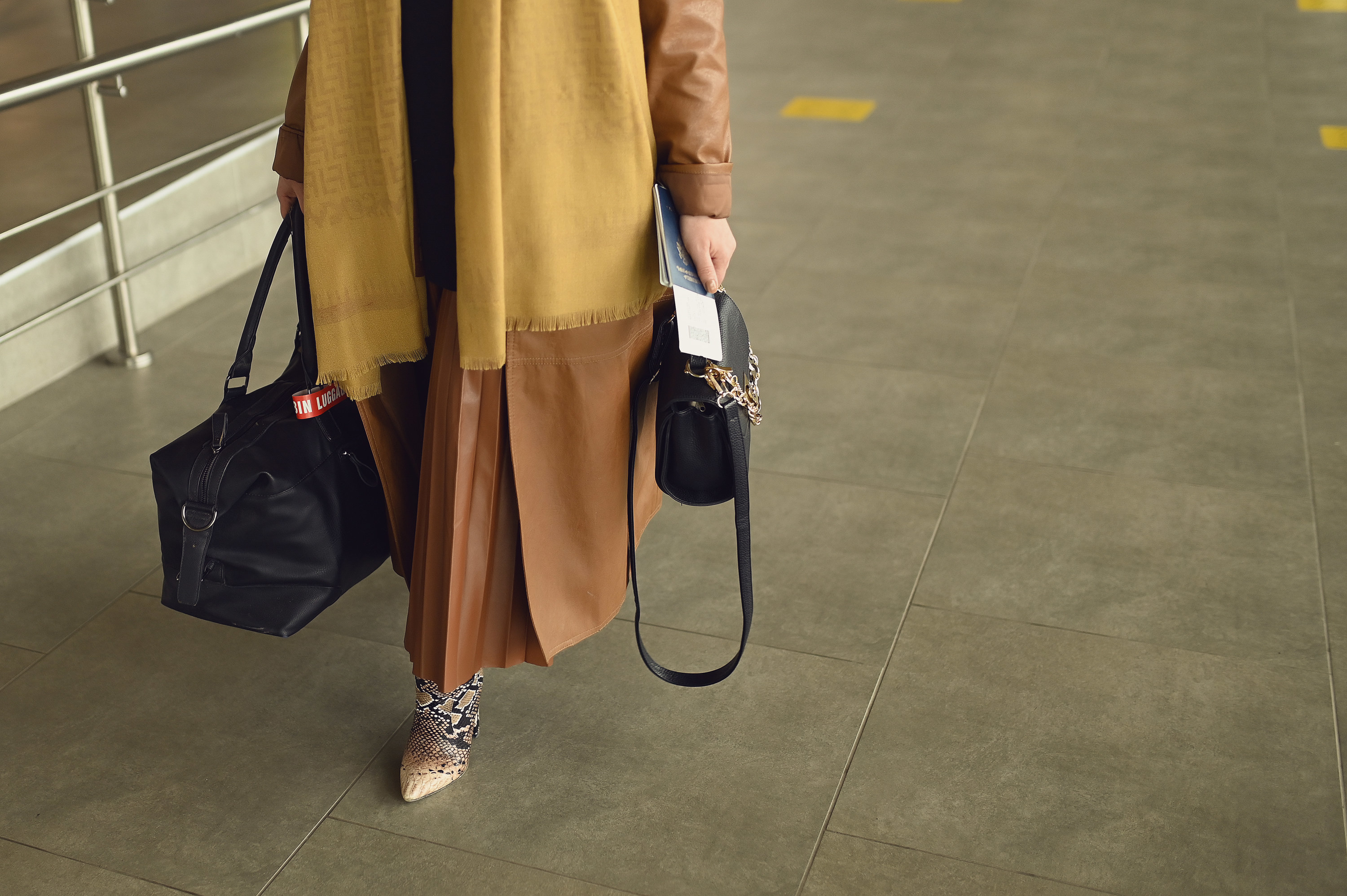 a traveler wearing a scarf