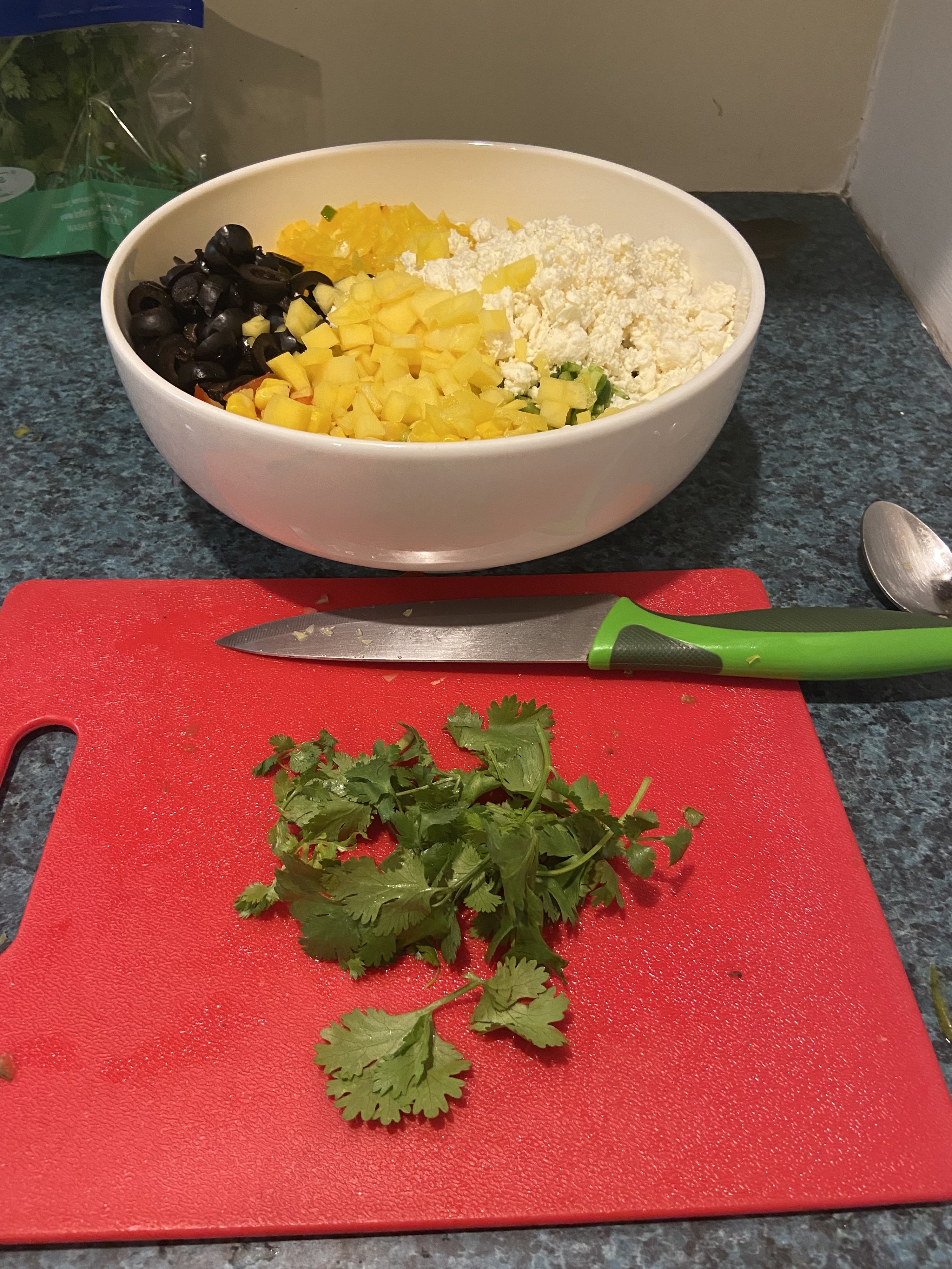 chopped cilantro on a cutting board