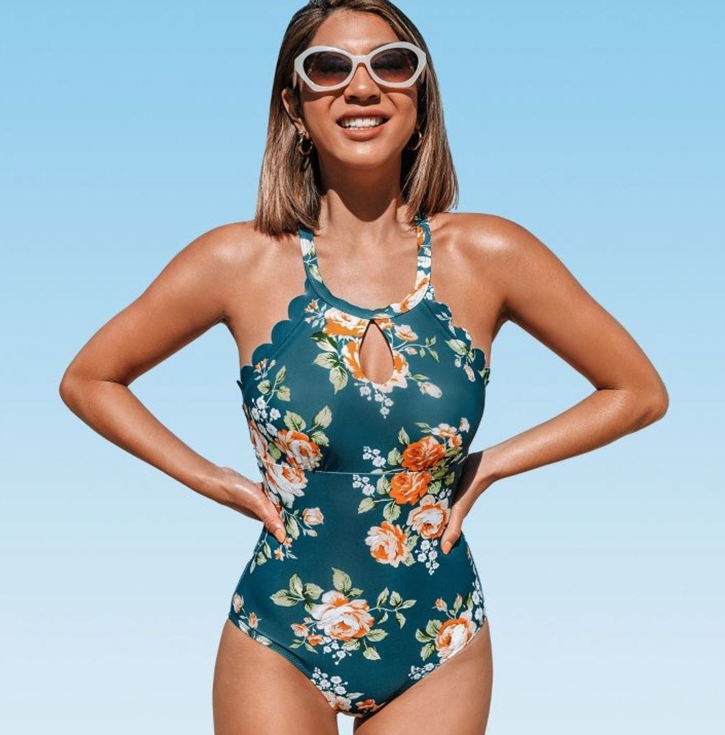 model wearing floral one piece