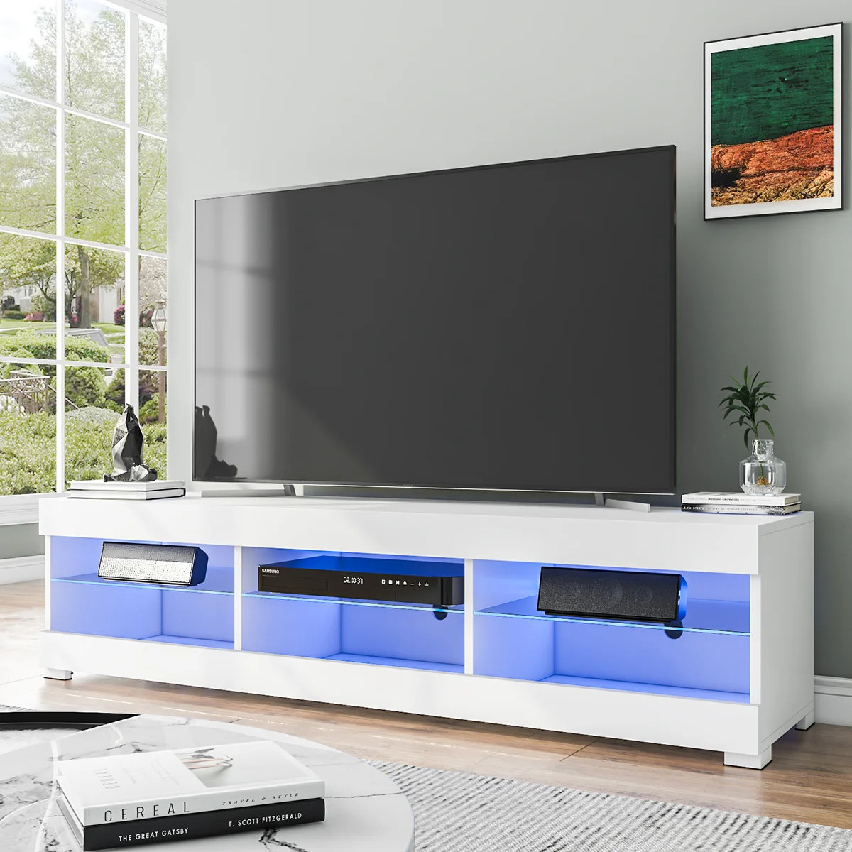 White TV stand with blue lights in family room