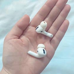 airpods pro in hand
