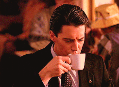Dale Cooper from Twin Peaks sipping coffee