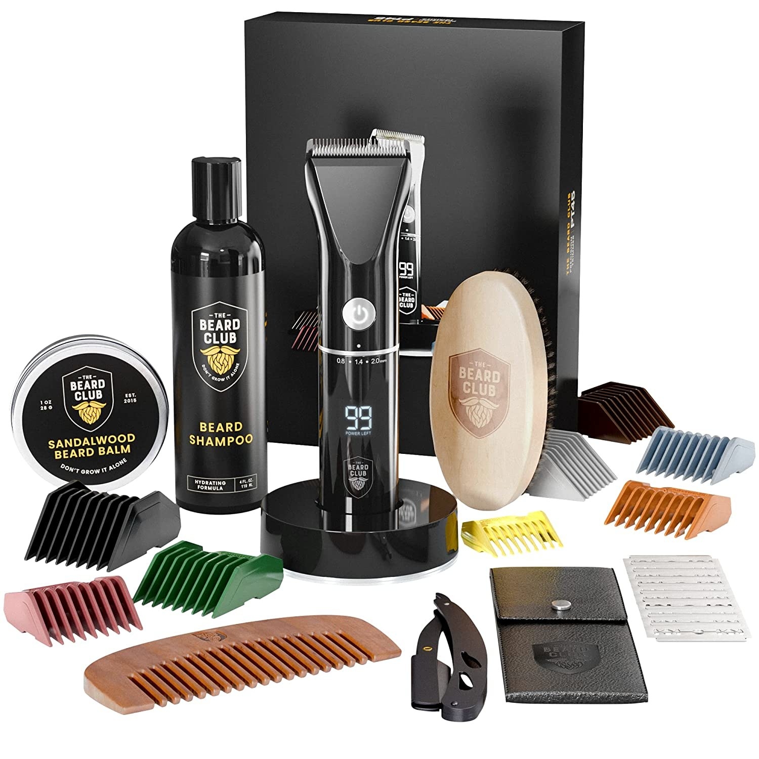 the grooming kit which comes with various guards, a comb, a brush, beard shamppo, beard balm, and more