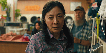 Michelle Yeoh as a laundromat owner  in &quot;everything everywhere all at once&quot;