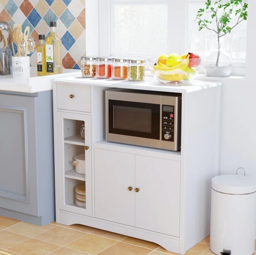 White kitchen cabinet with microwave shelf
