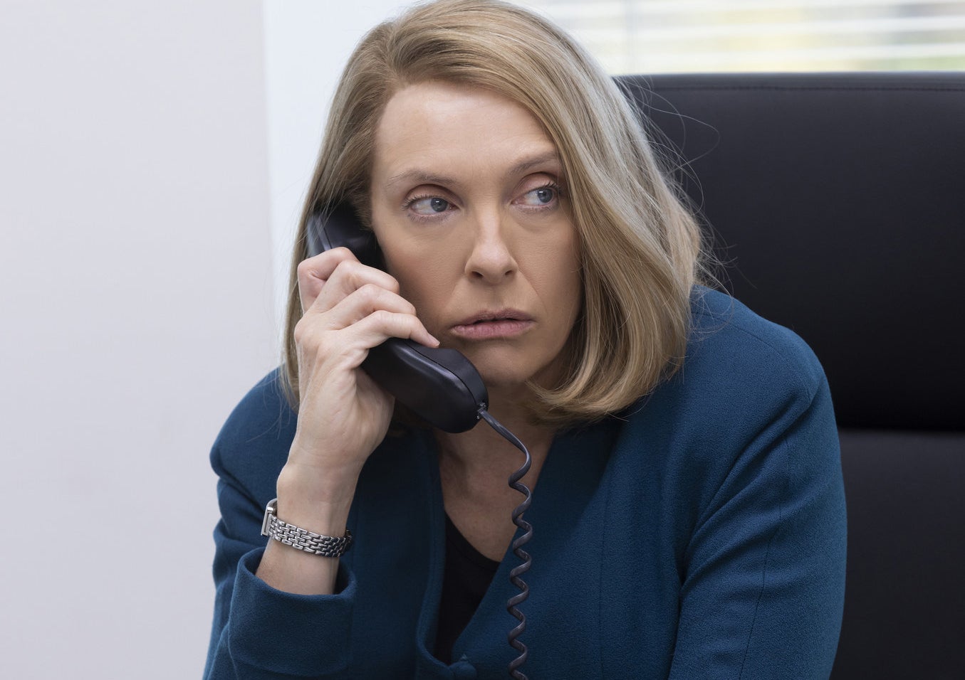 Toni Collette on the phone