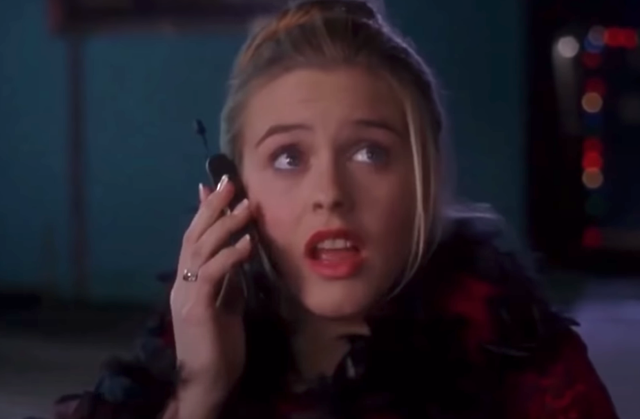 Alicia Silverstone as Cher on the phone