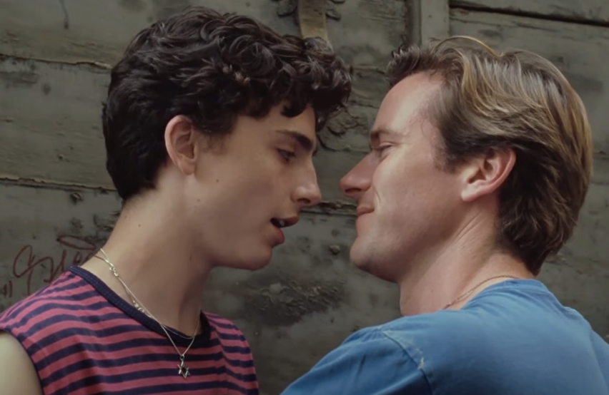Timothée Chalamet as Elio and Armie Hammer as Oliver about to kiss