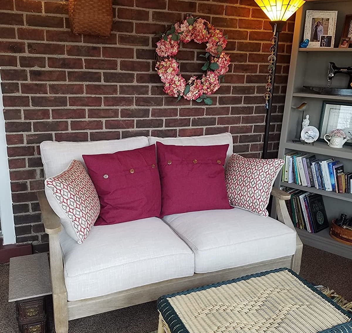 the neutral colored loveseat