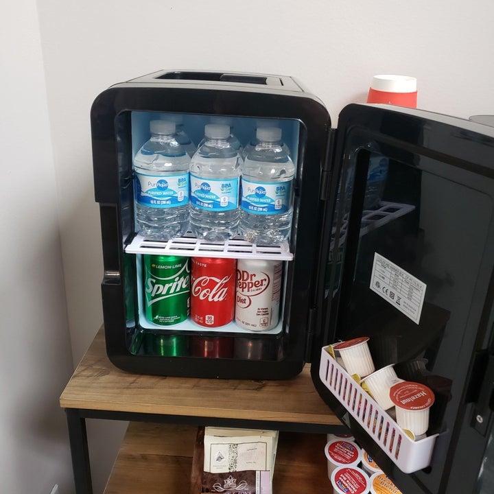 a reviewer photo of the fridge filled with drinks