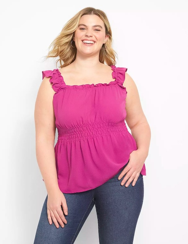 Model wearing fuchsia top and jeans